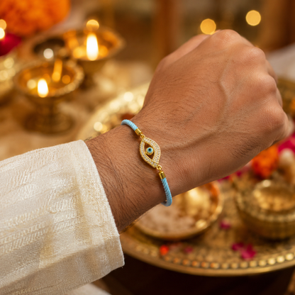 Sky Blue Evil Eye Designer Rakhi with Gold-Tone AD Stone Charm